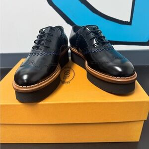 Tod's Women's Black and Navy Platform Shoes